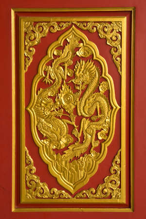 handicraft gold dragon at Chinese templeの写真素材