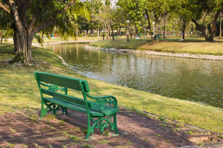 green seat in the park in Thailandの写真素材