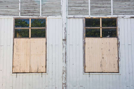 antique wooden wall and windowsの写真素材