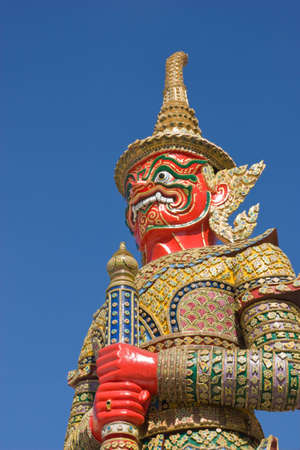  red giant image aroundthe temple of emerald Buddha Bangkok Thailandの写真素材
