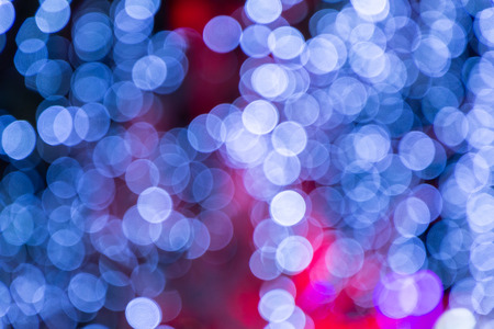 Colorful abstract blurred circular bokeh light of night city street for background. graphic design and website template idea concept design.の写真素材