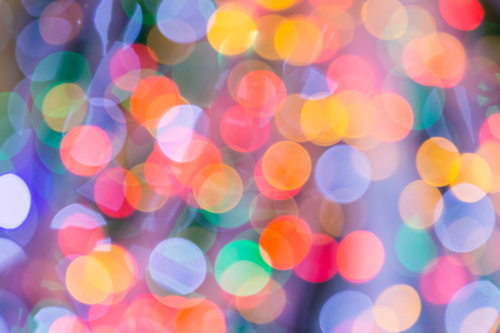 Colorful abstract blurred circular bokeh light of night city street for background. graphic design and website template idea concept design.の写真素材