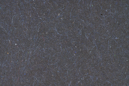 Black recycled paper background for business communication and education concept design.の写真素材