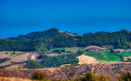Hills in the Reggio Apennines in the early days of autumn. HDR imageの写真素材
