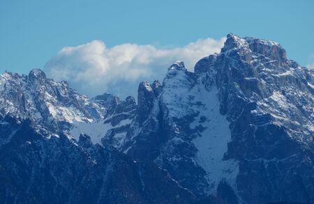 Snowy rocky peaks in the winter season