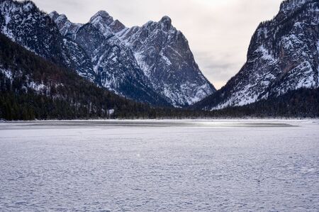 The frozen surface of Lake Dobbiaco in the middle of winter