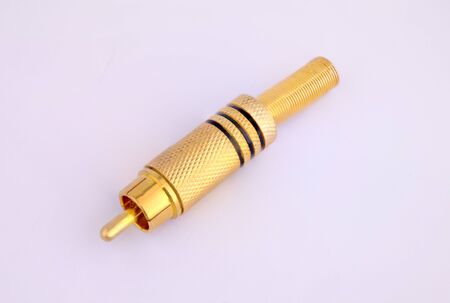 RCA connectors with a gold covering for audio and video. Isolated on white background.の写真素材