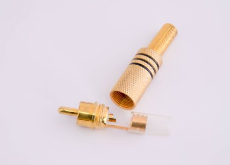 Open RCA connectors with a gold covering for audio and video. Isolated on white background.の写真素材