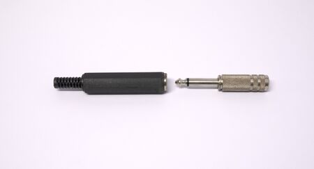 Old electronic connectors used for audio. Accessories for mechanic electronics. isolated on white backgroundの写真素材