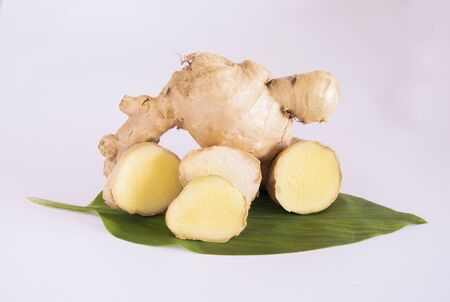 Ginger root with leaf isolated on white backgroundの写真素材