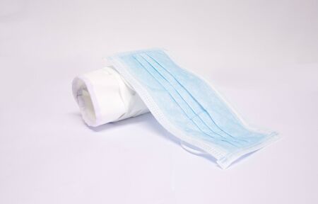 Dust mask And germs, filtering bacteria isolated on white backgroundの写真素材