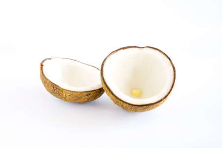 Half of coconut fruit,and pulp of coconuts is rich in fiber and minerals. smooth taste. isolated on white background.の写真素材