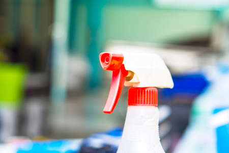 Injector head foggy red plastic water spray bottle. foggy, sanitary