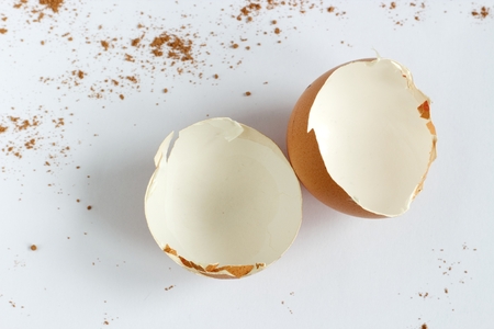Photo of broken egg shell on the white background.の写真素材