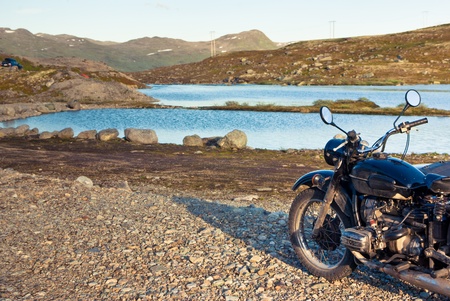 travell on retro motorbikeの写真素材