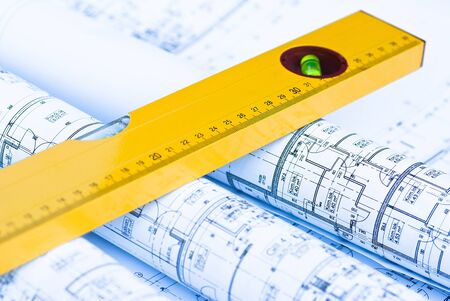 spirit level and architectural drawingsの写真素材