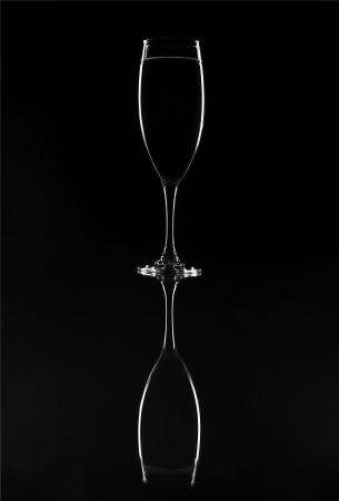 low key glass of champagneの写真素材