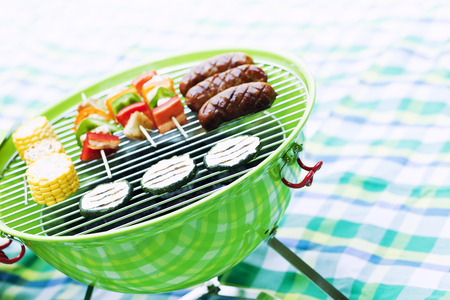 Grill bbq party with sausages,and vegetablesの写真素材