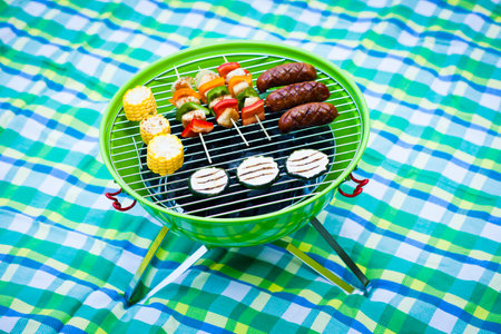 Grill bbq party with sausages,and vegetablesの写真素材