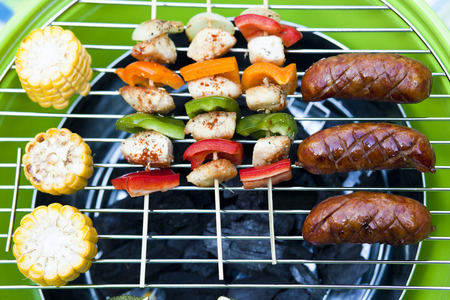 barbecue skewers and grilled vegetablesの写真素材