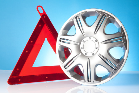 warning triangle and alloy wheelの写真素材