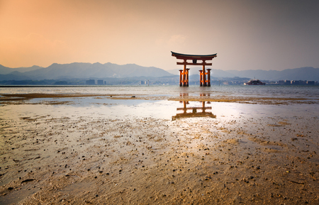 Itsukushima Shrine on Miyajima at sunsetの写真素材