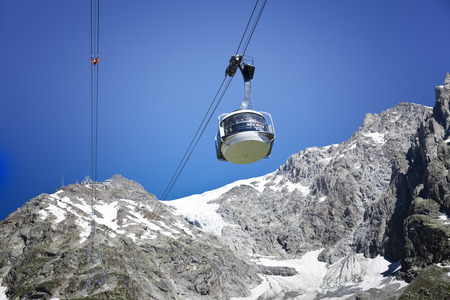 COURMAYEUR, IT - JULY 29, 2016: Cabin of new cableway SKYWAY MONTE BIANCO on the Italian side of Mont Blanc, Start from Entreves to Punta Helbronner at 3466 mt, in Aosta Valley region of Italy.のeditorial素材