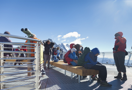COURMAYEUR, IT - JULY 29, 2016: Unidentified people take a picture a panoramic terrace of Punta Helbronner new SKYWAY MONTE BIANCO terminal in Aosta Valley region of Italy.のeditorial素材
