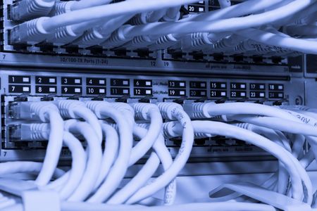 Toned image of network cables connected to switch