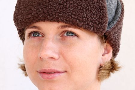 Young woman wearing winter cap. Autumnal portrait.の写真素材