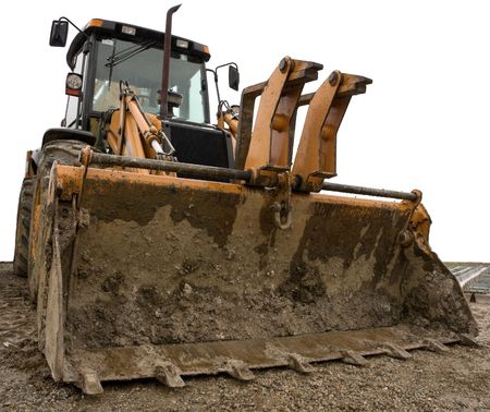 Dirty yellow  bulldozer isolated on white