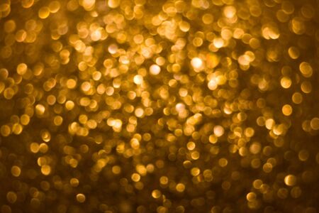 Abstract background of holidays gold lights の写真素材