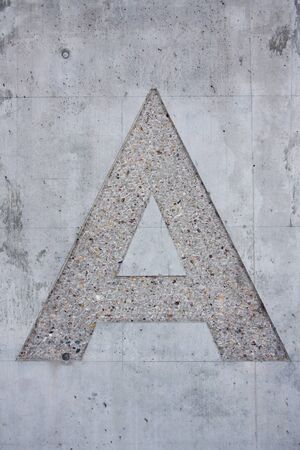Letter A written on a concrete wall
