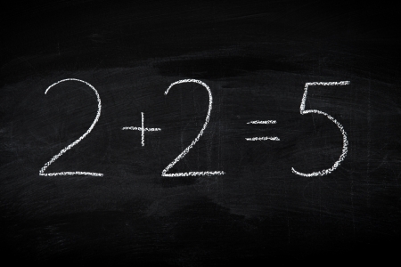 Mistake in math formula on chalkboard - education concept illustrated on blackboardの写真素材