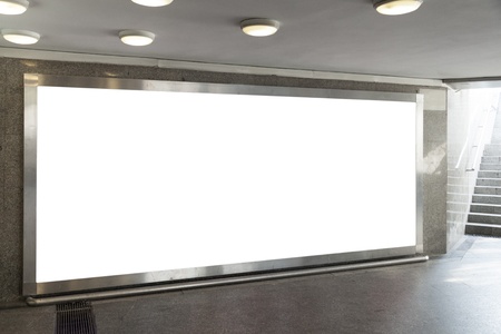 Blank billboard located in underground hallの写真素材