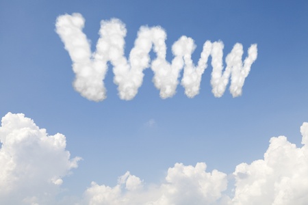 WWW World wide web concept text in clouds on blue skyの写真素材