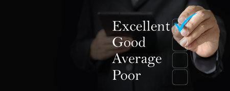 Elevate Your Business through Exceptional Performance. A Businessman Marks the 'Excellent' Level with a Correct Mark. Customer Satisfaction Reviews for the Business Successの写真素材