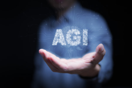 Futuristic concept of AGI with human interaction, glowing circuit letters symbolizing consciousness, human-AI collaboration, and the philosophical vision of Artificial General Intelligence.の写真素材