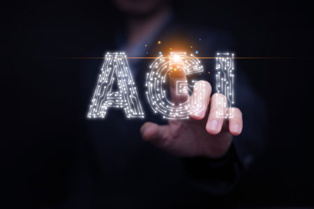Futuristic concept of AGI with human interaction, glowing circuit letters symbolizing consciousness, self-awareness, human-AI connection, and the philosophical vision of artificial intelligence.の写真素材