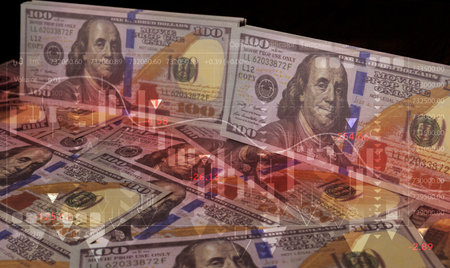 Recession and crisis concept: Banknotes with downward arrows and graphs represent the decline of the...