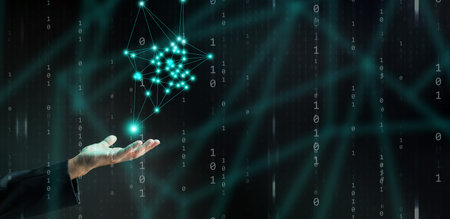 Digital network technology concept: an individualâ€™s hand interacts with and utilizes digital...