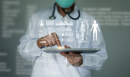 Digital health data and electronic health record or EHR. Doctor uses tablet to access patient records to improve diagnosis, treatment, disease management, and healthcare outcomesの写真素材