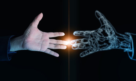 Human and virtual hand connection, representing digital twins, artificial intelligence collaboration, smart future, and innovation through digital communication and virtual reality.の写真素材