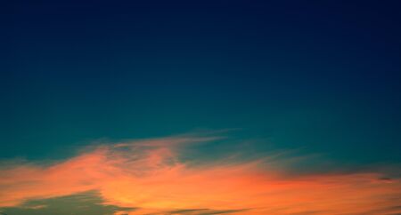a unique pattern of sunset on a blue skyの写真素材