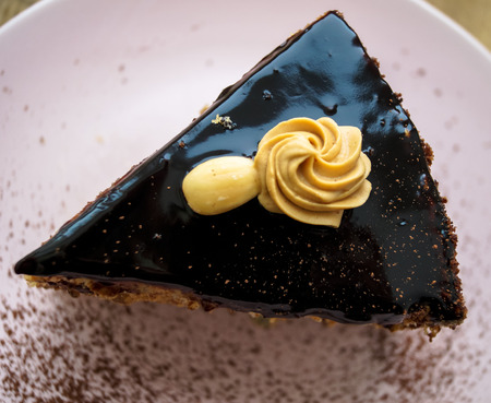 a piece of chocolate cake with nuts