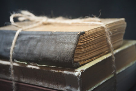 day books old retro books on black background horizontal photoの写真素材
