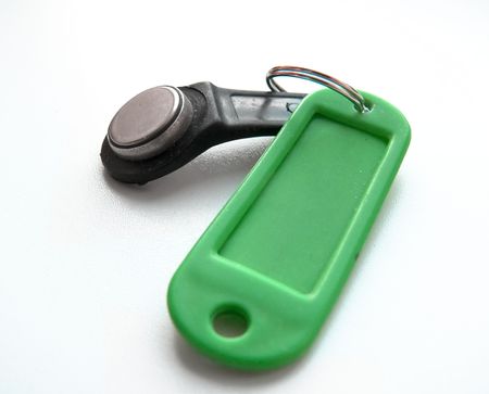 The magnetic key with a tablet. On a white background, isolated.