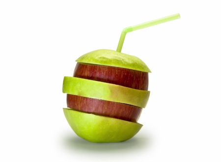 Red and green apple slices isolated on white background. In apple juice straw stuck.の写真素材