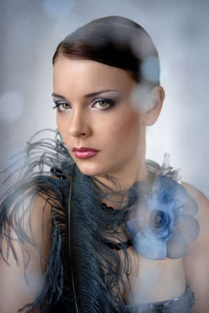 Portrait of beautiful young girl. Evening make-up, evening jewelry.の写真素材