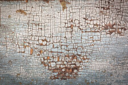 texture of painted wood peeling off from time to time and turned into old background
